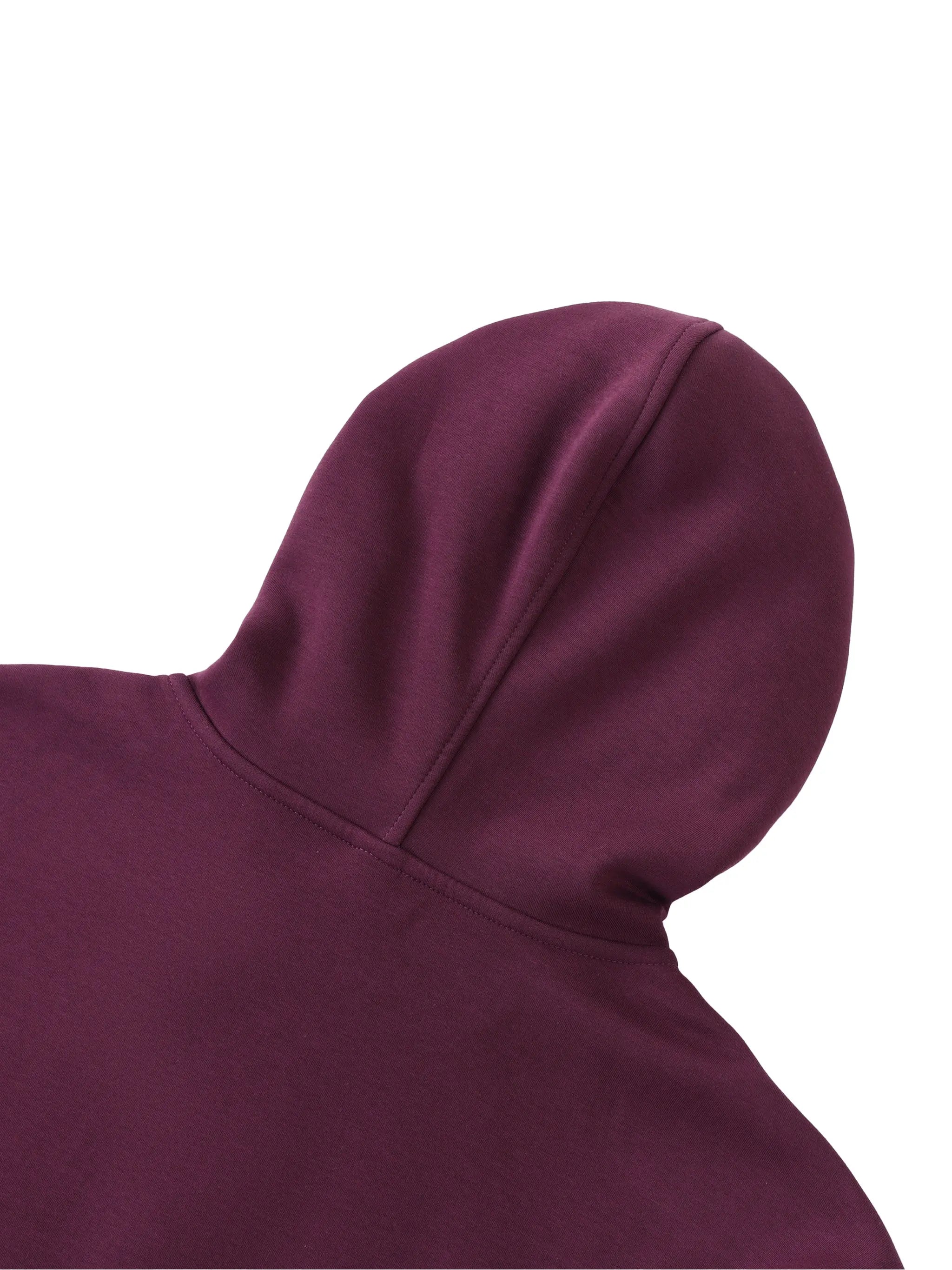 Close-up of ODMPOD plum purple heavyweight hoodie hood with detailed stitching