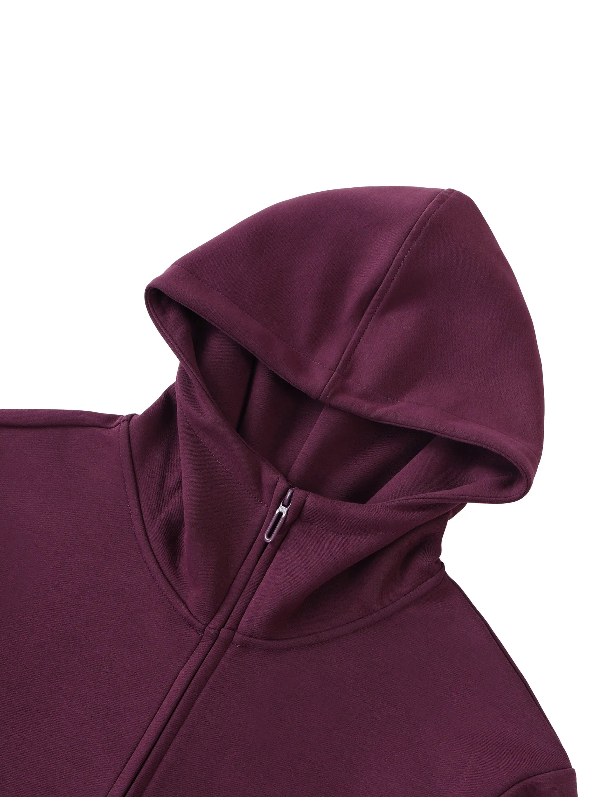 Close-up of ODMPOD plum purple heavyweight hoodie with zipper and hood detail